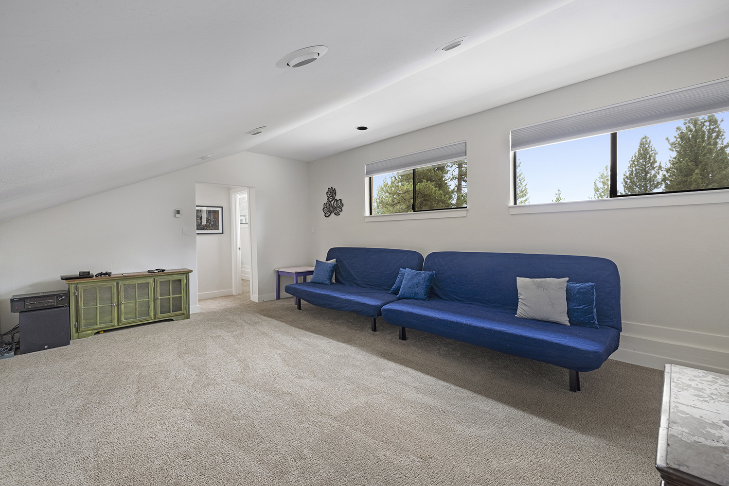 Den lounge with fold-out foam beds for kids