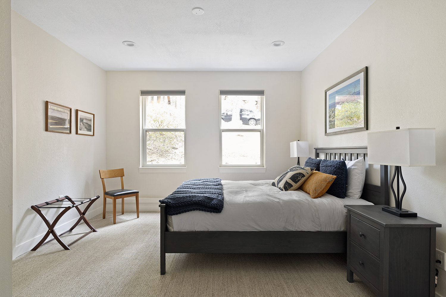 Bedroom 2 – Cozy queen with ensuite bath