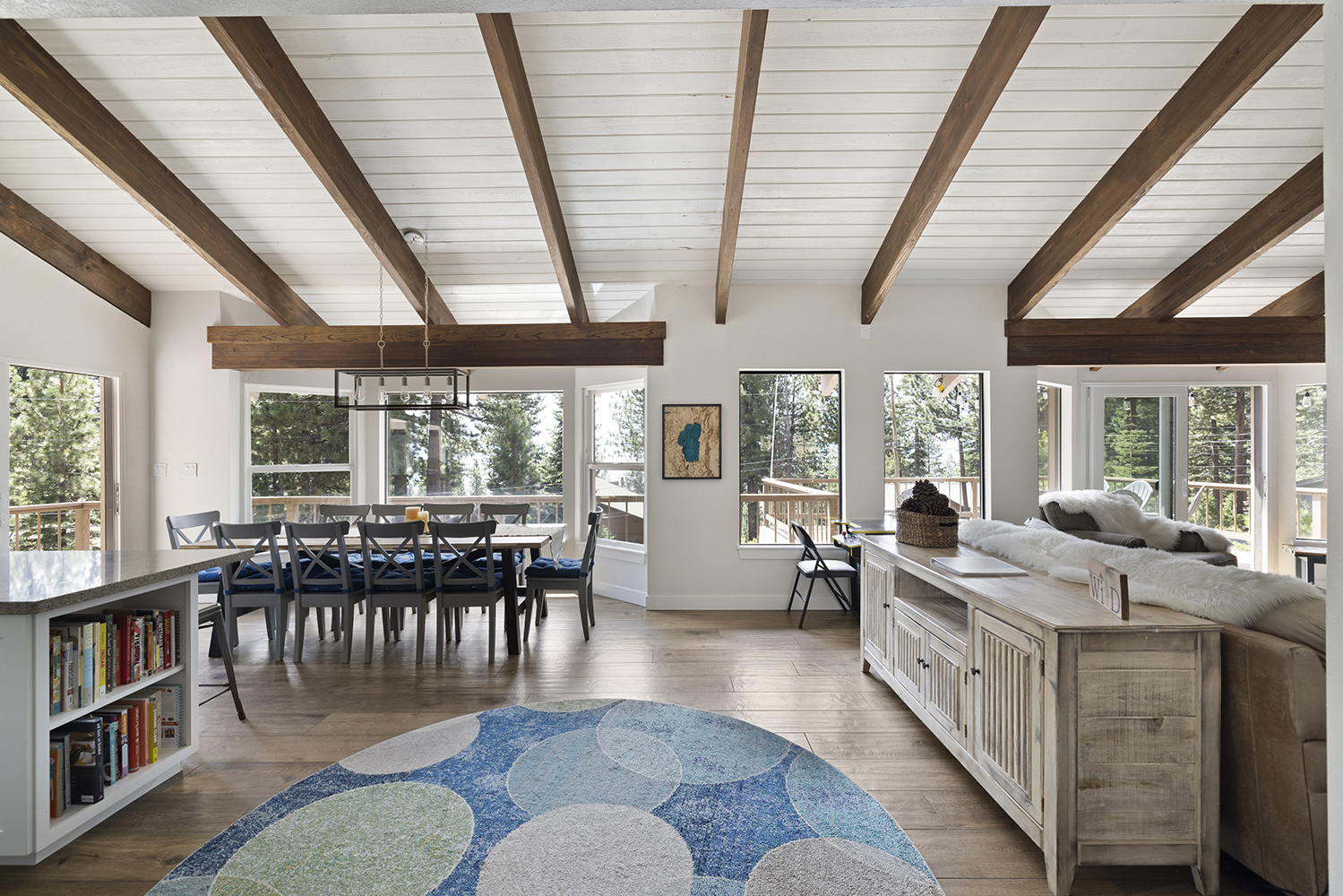 The great room at Kinpine House, with vaulted ceilings and dining space for a large group
